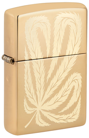 Front shot of ˫ Leaf Feather Design High Polish Brass Windproof Lighter standing at a 3/4 angle.